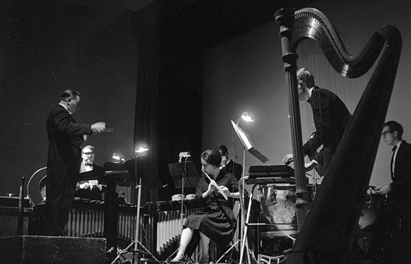 man conducting ensemble